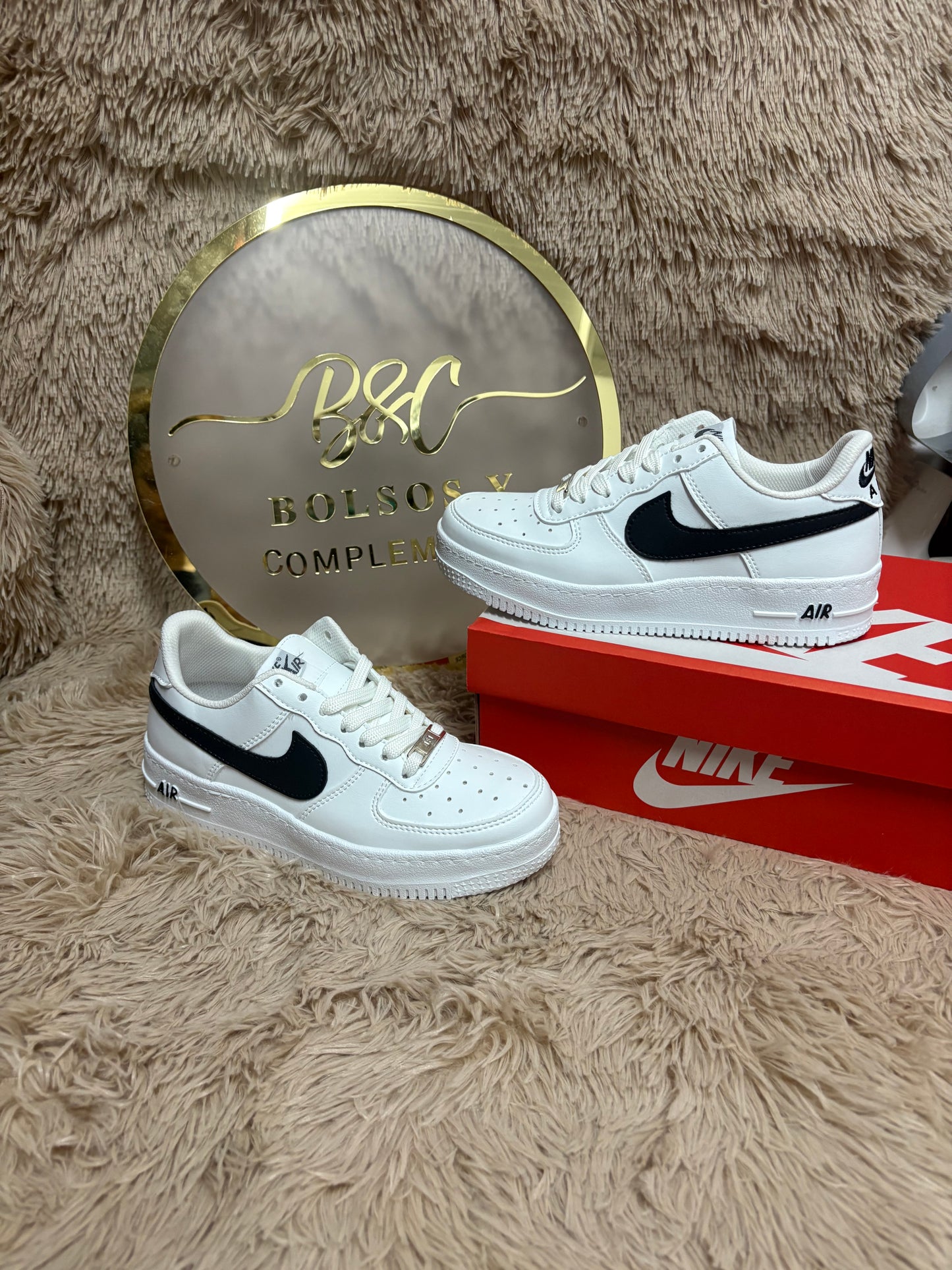 . Zapatilla air símbolo negro