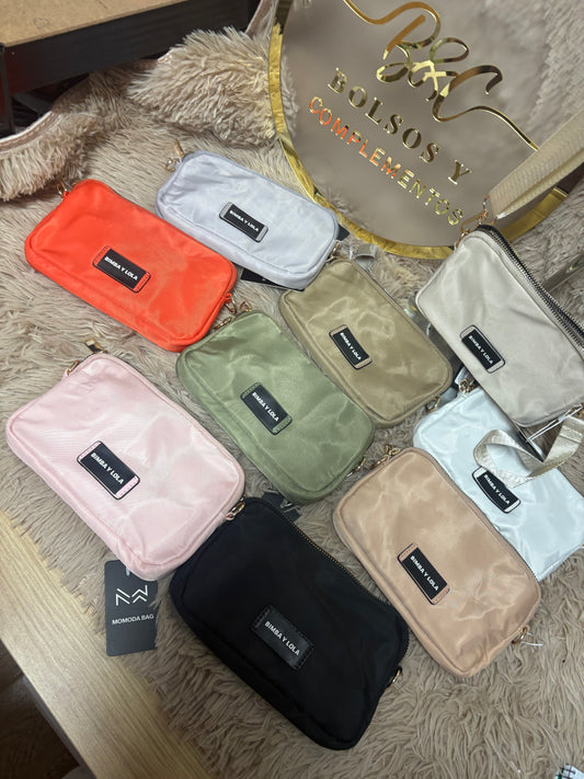 . Bolsita o cartera de mano